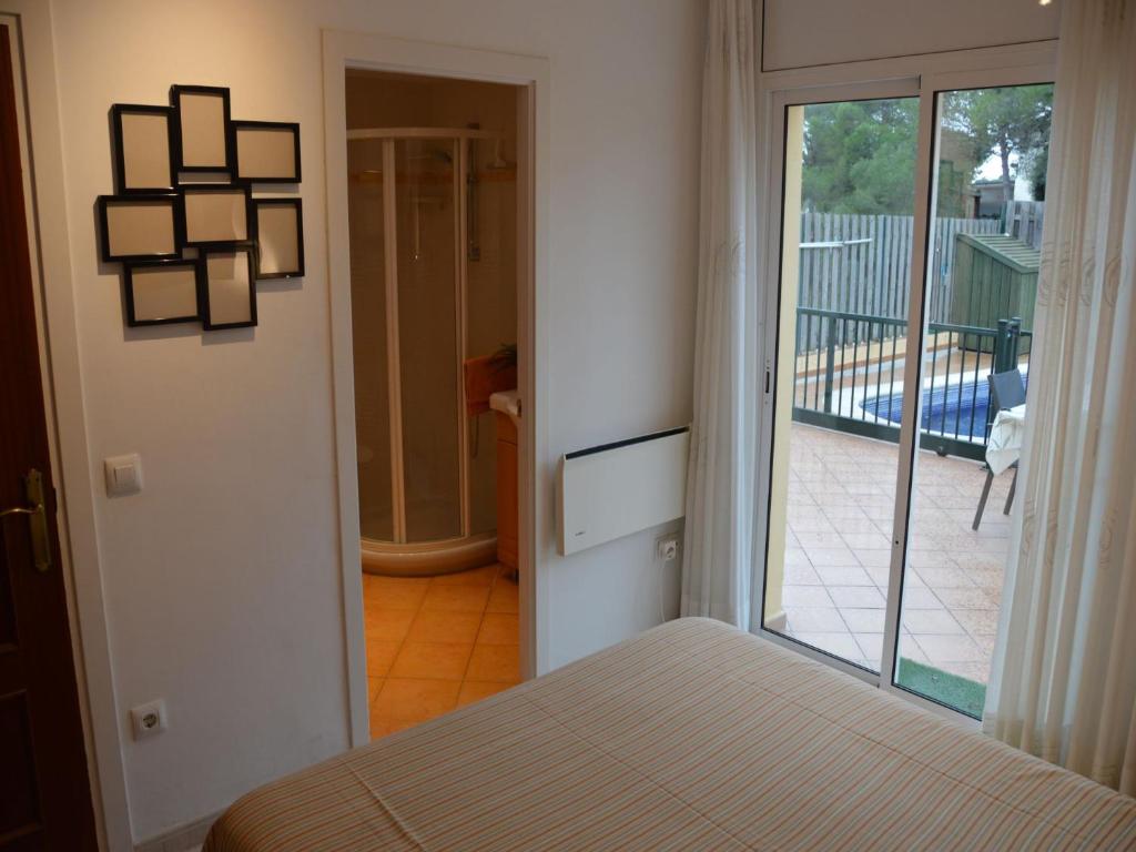 Postel nebo postele na pokoji v ubytování Villa De Ensueño