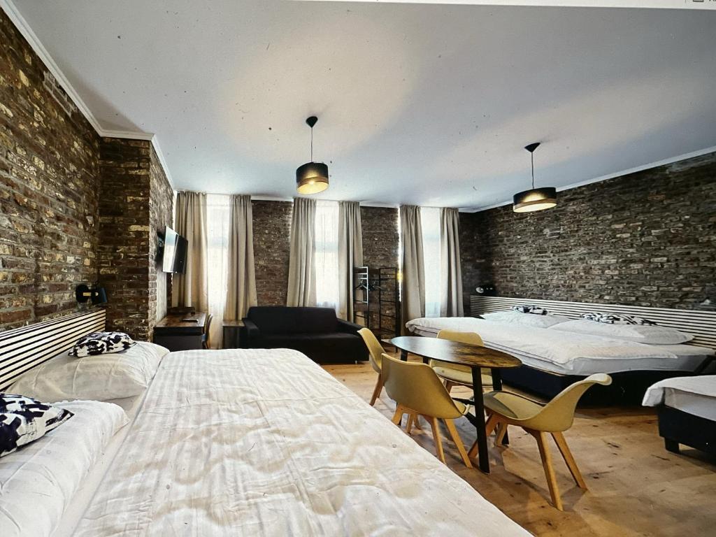 Postel nebo postele na pokoji v ubytování Hotel Soers