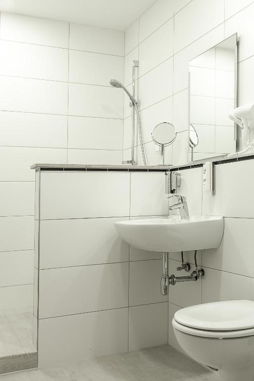 Koupelna v ubytování Hotel Soers