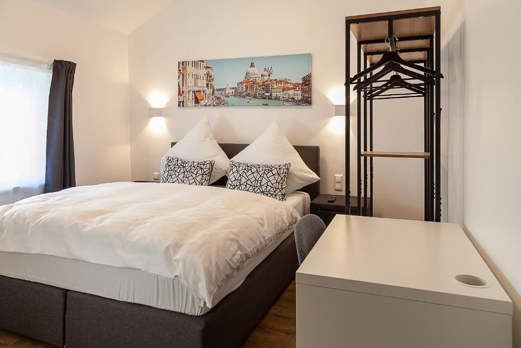 Postel nebo postele na pokoji v ubytování Hotel Soers