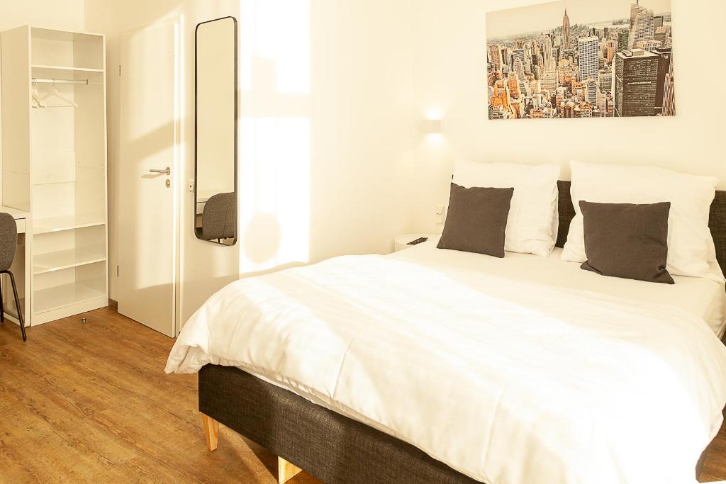 Postel nebo postele na pokoji v ubytování Hotel Soers