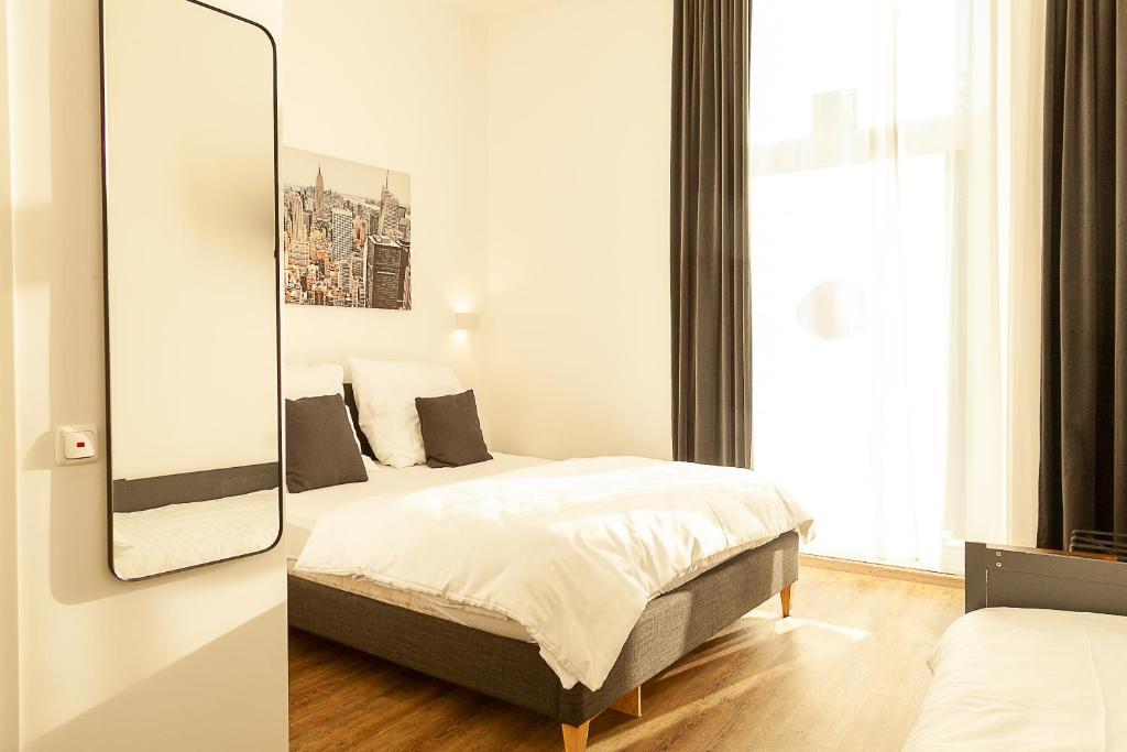 Postel nebo postele na pokoji v ubytování Hotel Soers