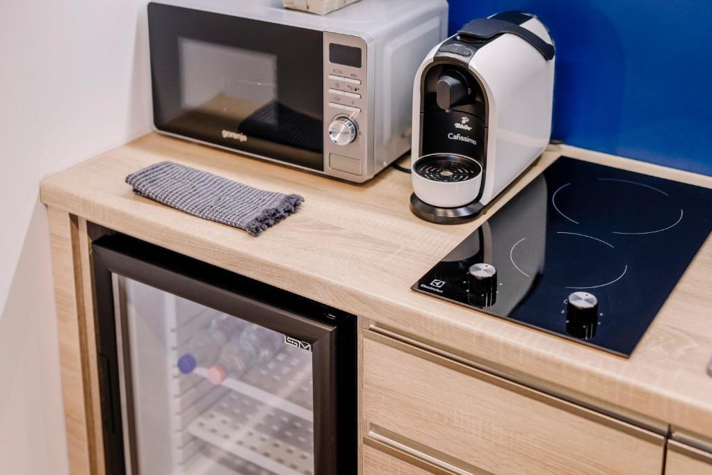 Kuchyňa alebo kuchynka v ubytovaní Amadé Apartmanok 2