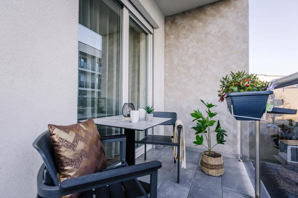 Balkón alebo terasa v ubytovaní Amadé Apartmanok 2