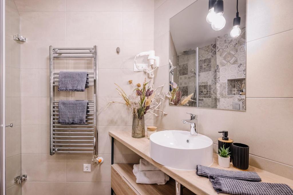 Kúpeľňa v ubytovaní Amadé Apartmanok 2