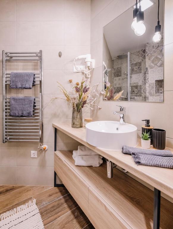 Kúpeľňa v ubytovaní Amadé Apartmanok 2