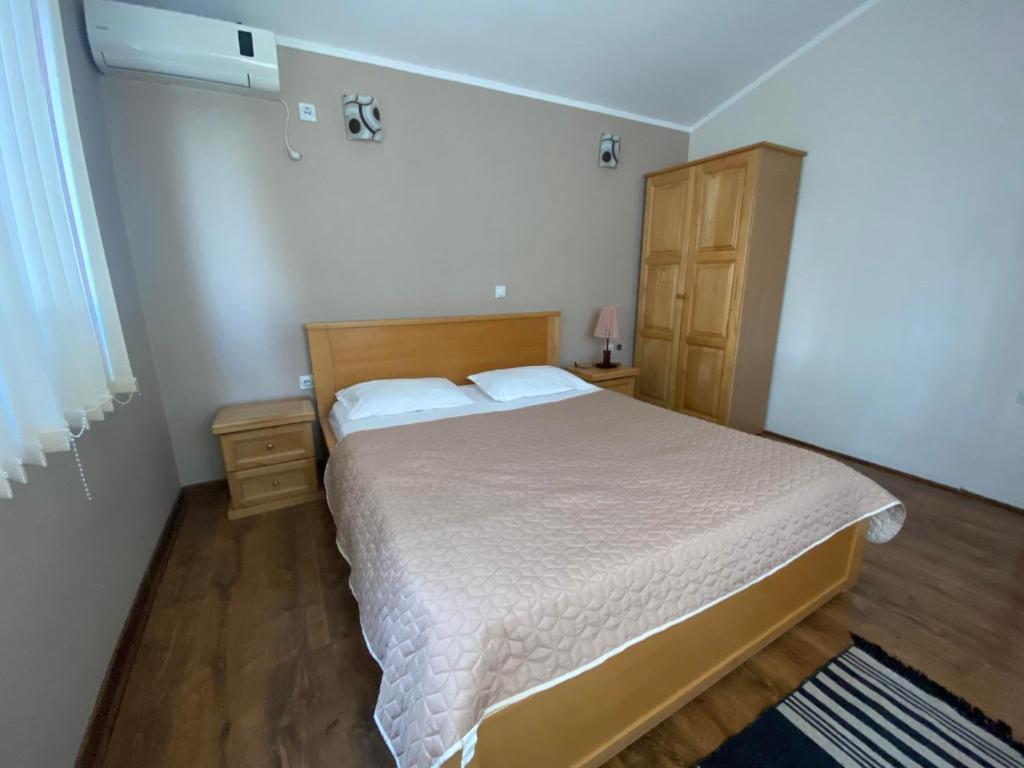 Postel nebo postele na pokoji v ubytování Casa Liburnia