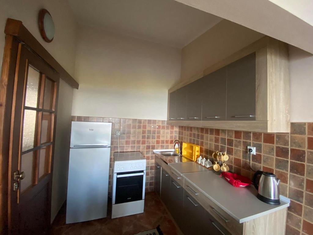 Kuchyň nebo kuchyňský kout v ubytování Casa Liburnia