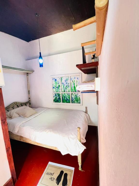 Postel nebo postele na pokoji v ubytování Hotel Casa Chapultepec