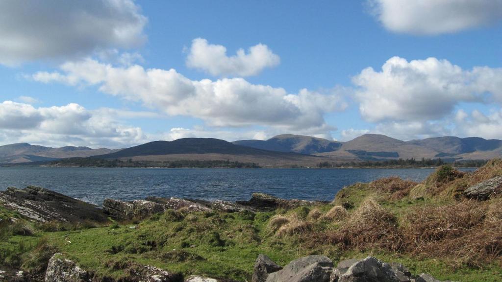 a large body of water with mountains in the background at An Bruachan B&B in Kenmare