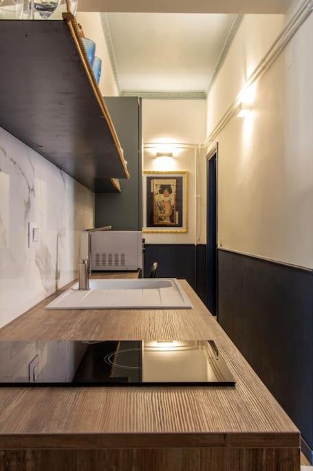 Kuchyňa alebo kuchynka v ubytovaní Rasella44, Blu Apartment