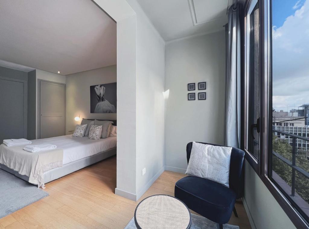 Postel nebo postele na pokoji v ubytování Stay U-nique Apartments Rambla Catalunya II