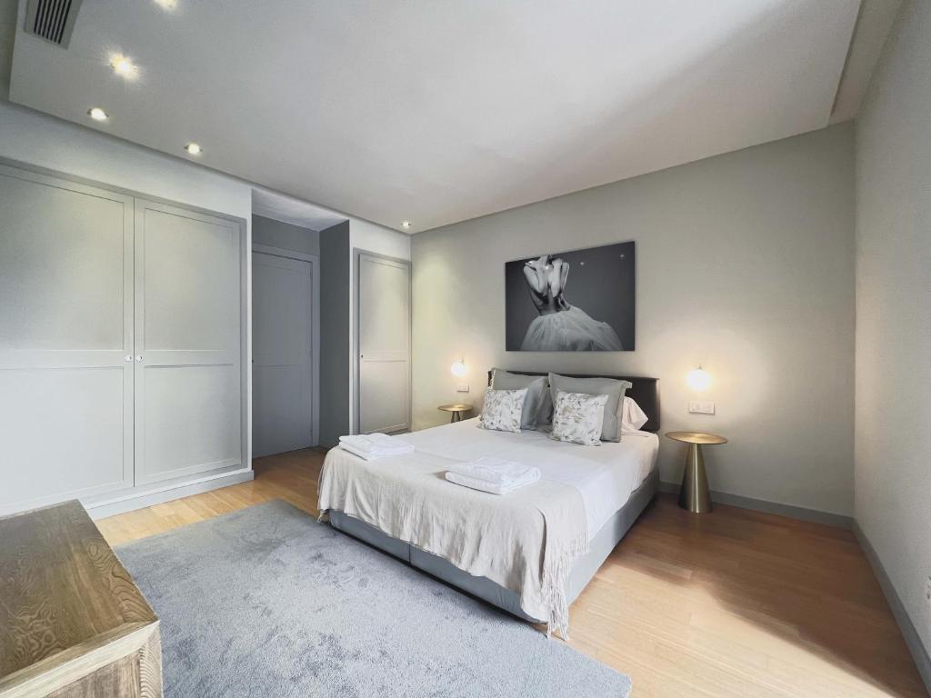 Postel nebo postele na pokoji v ubytování Stay U-nique Apartments Rambla Catalunya II