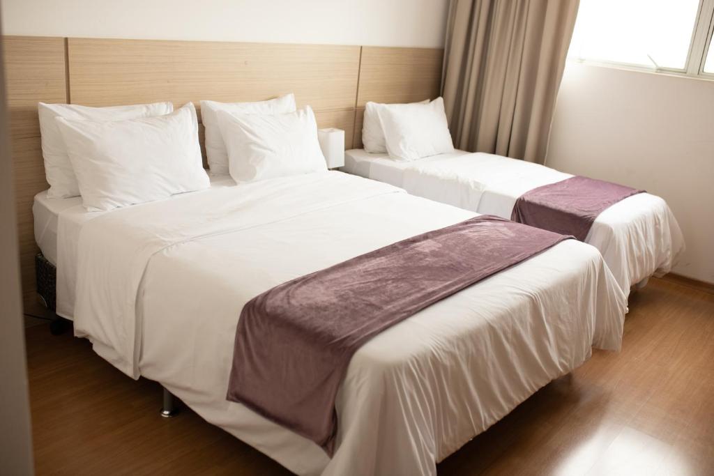 Postel nebo postele na pokoji v ubytování Hotel Franco