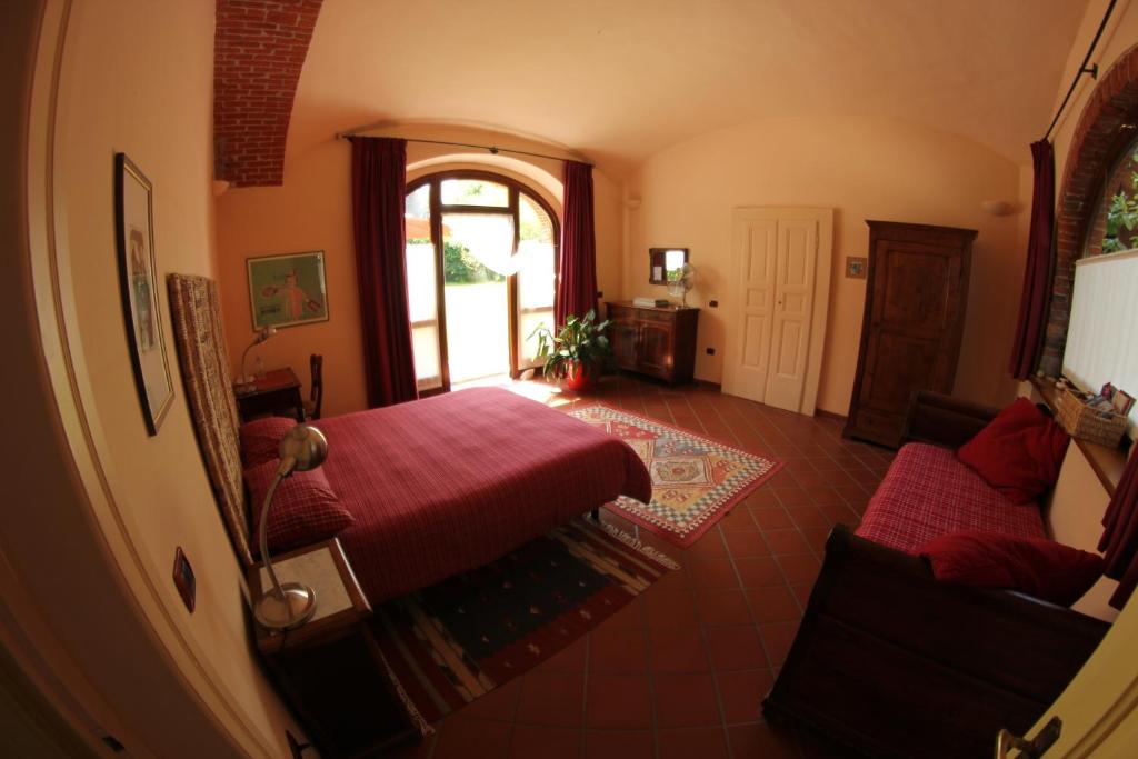 Postel nebo postele na pokoji v ubytování B&B Cascina Moncrava