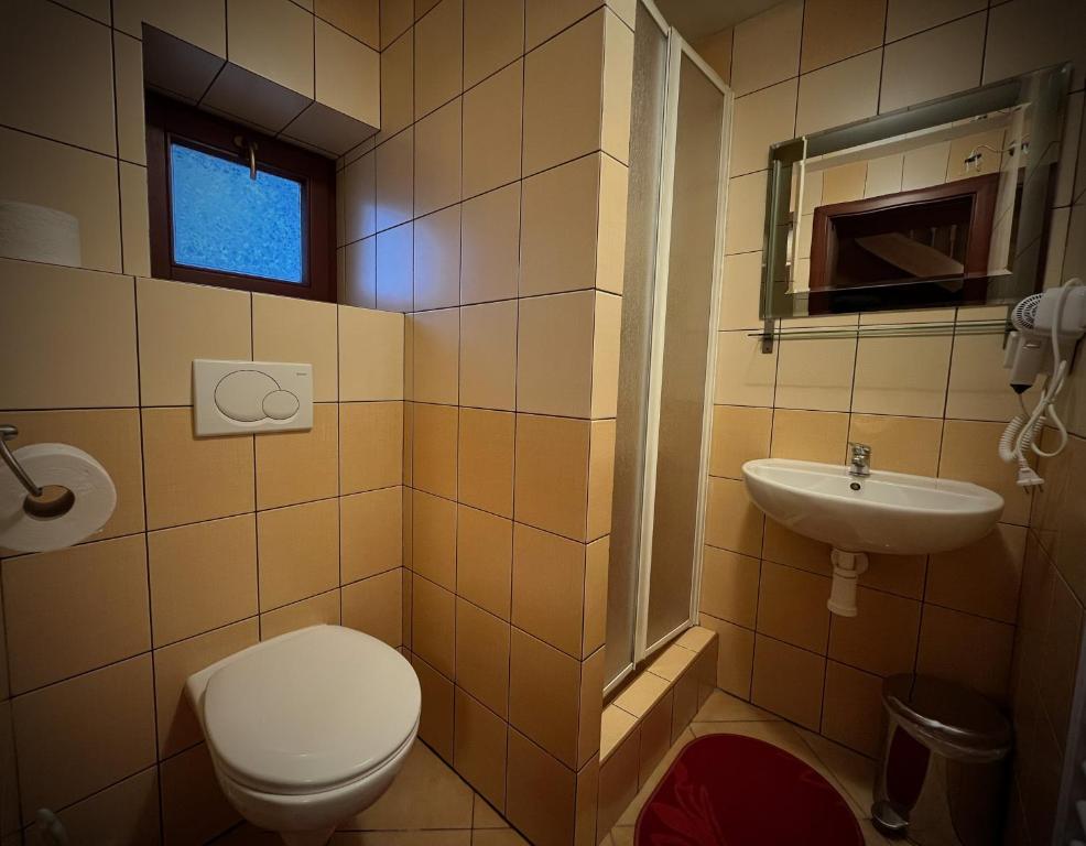 Kúpeľňa v ubytovaní Penzión Pri Kaštieli Záturčie