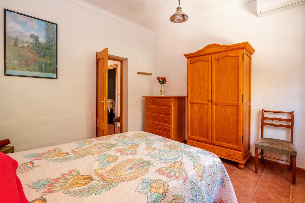 Posteľ alebo postele v izbe v ubytovaní Casa La Encina