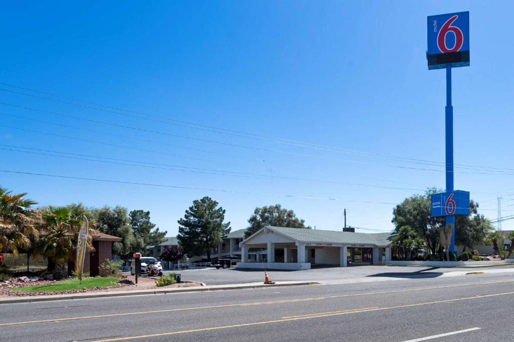 a gas station on the side of a street at Motel 6-Kingman, AZ - Route 66 West in Kingman