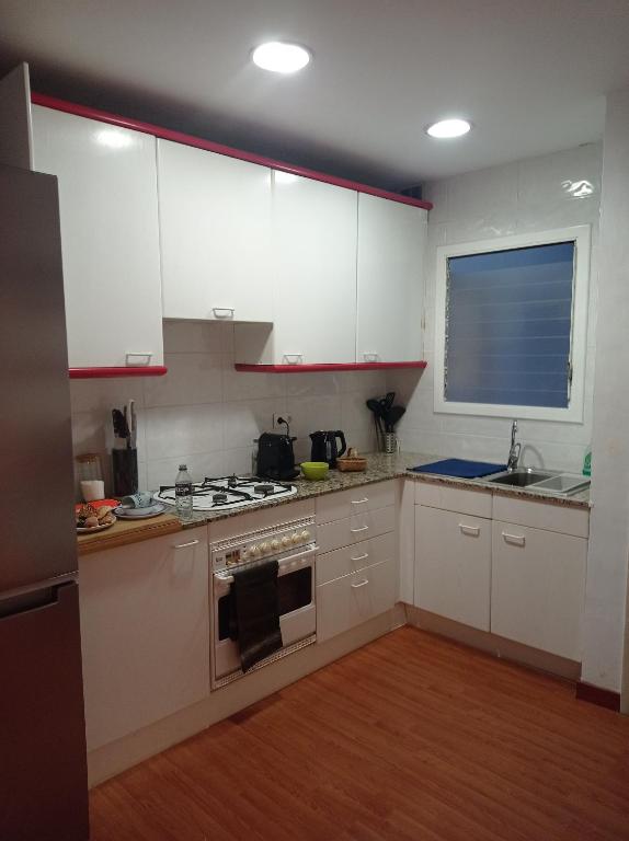 Kuchyň nebo kuchyňský kout v ubytování SWEET APARTMENT IN GRACIA DISTRICT!
