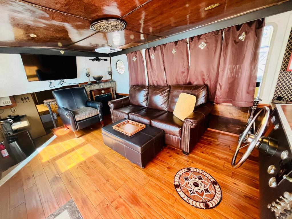 Boat Dolphin Delight 47 Foot Houseboat on the Gulf, at Dock With Gulf