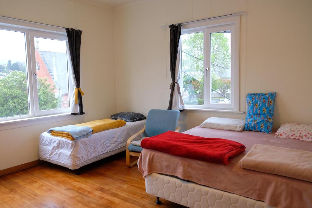 Postel nebo postele na pokoji v ubytování 3 spacious bedrooms