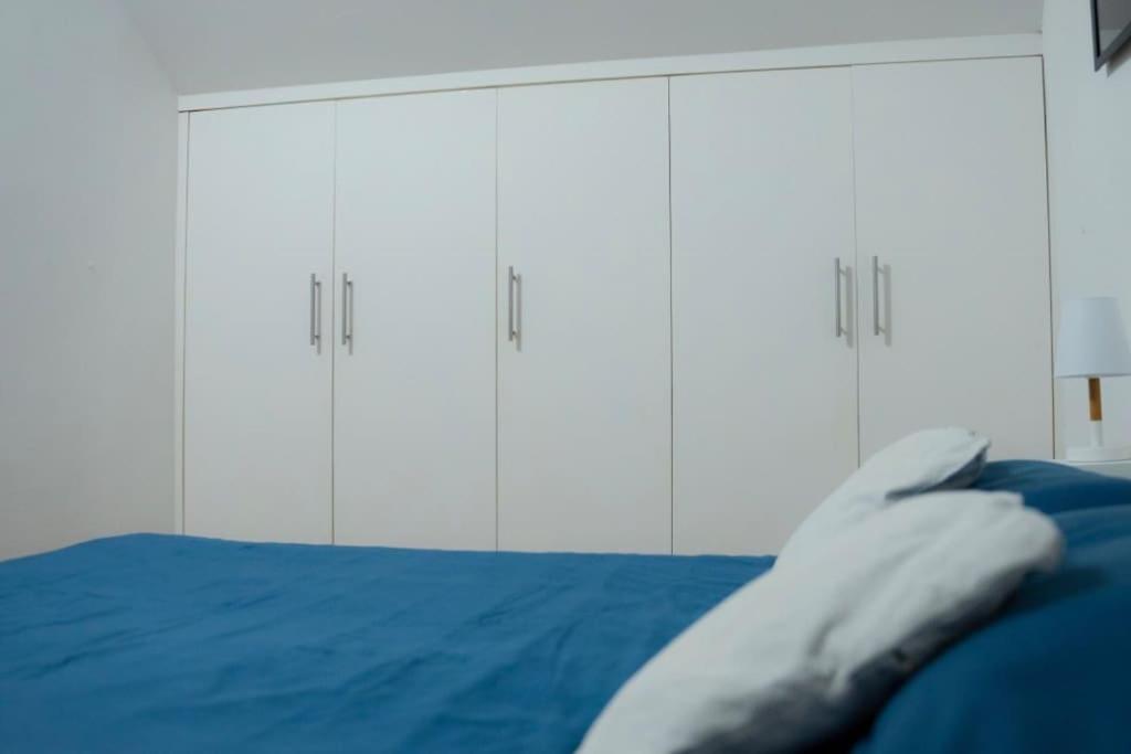 A bed or beds in a room at Hulu