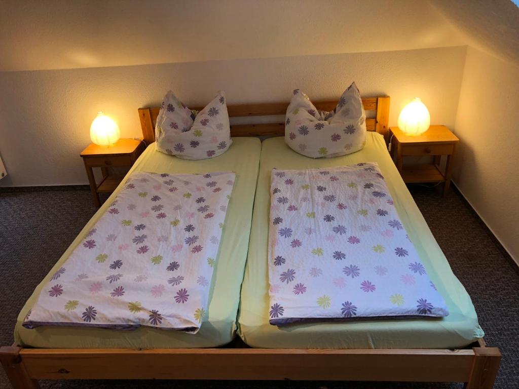 Postel nebo postele na pokoji v ubytování Graureiher