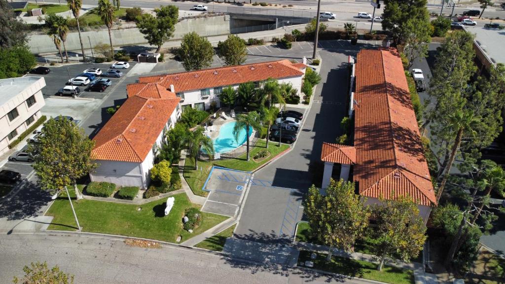 an overhead view of a house with a swimming pool at Hospitality Inn in San Bernardino