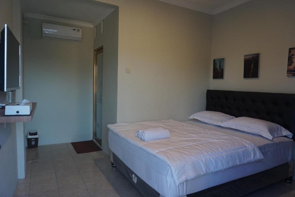 Postel nebo postele na pokoji v ubytování Alexandria12 Guest House