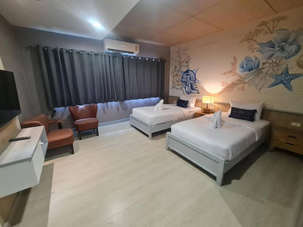 Posteľ alebo postele v izbe v ubytovaní Phi Phi Indigo Hotel