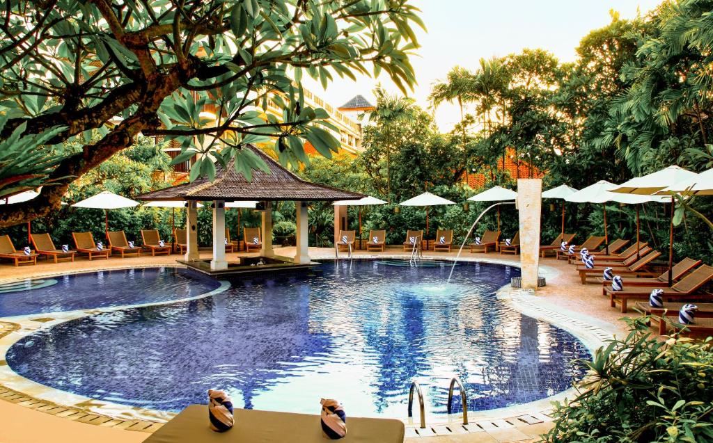 Bazén v ubytování Puri Raja Hotel nebo v jeho okolí