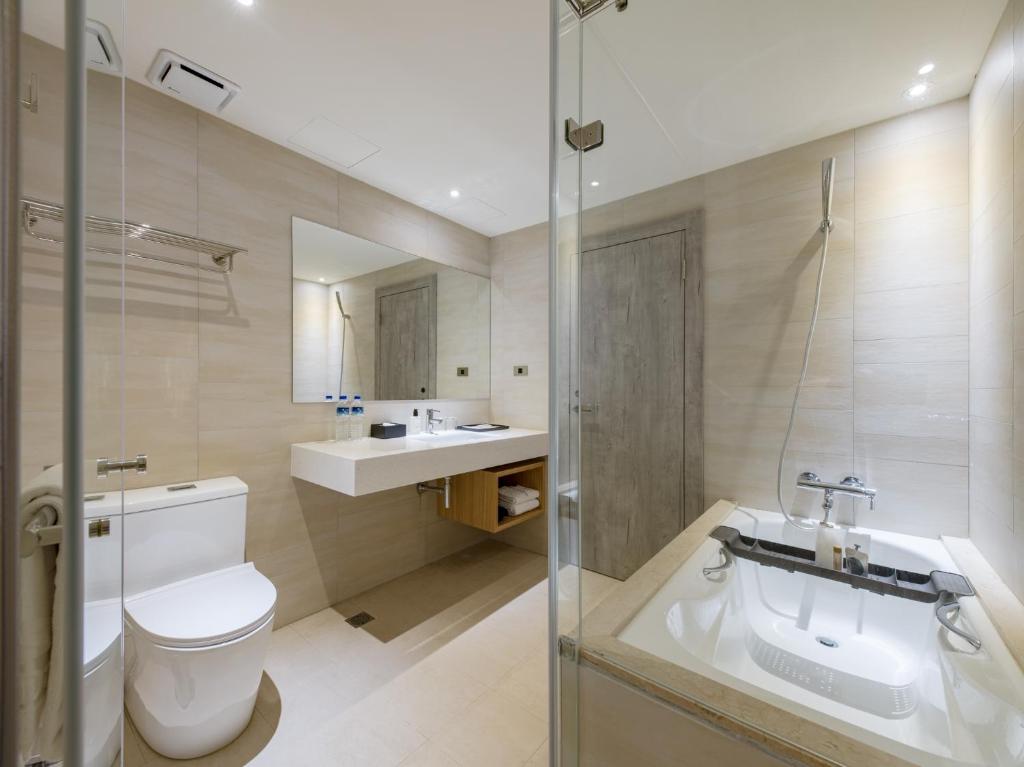 Koupelna v ubytování Dahu Park Hotel
