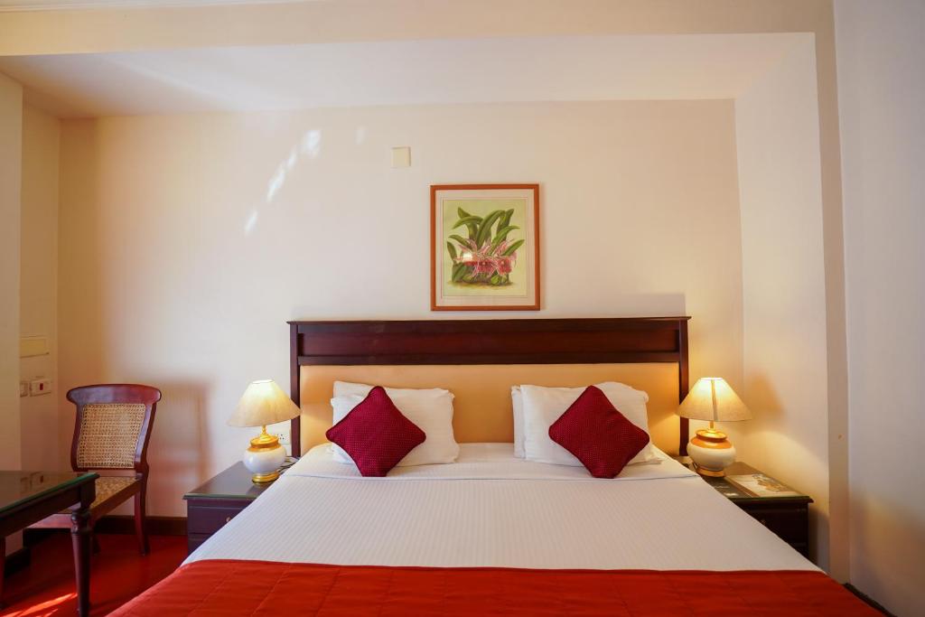 Postel nebo postele na pokoji v ubytování Hotel Arches