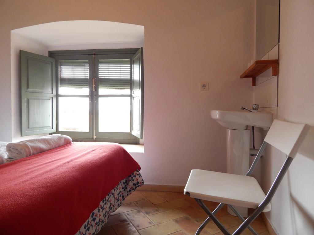 Postel nebo postele na pokoji v ubytování Casa La Espartería de la Corredera