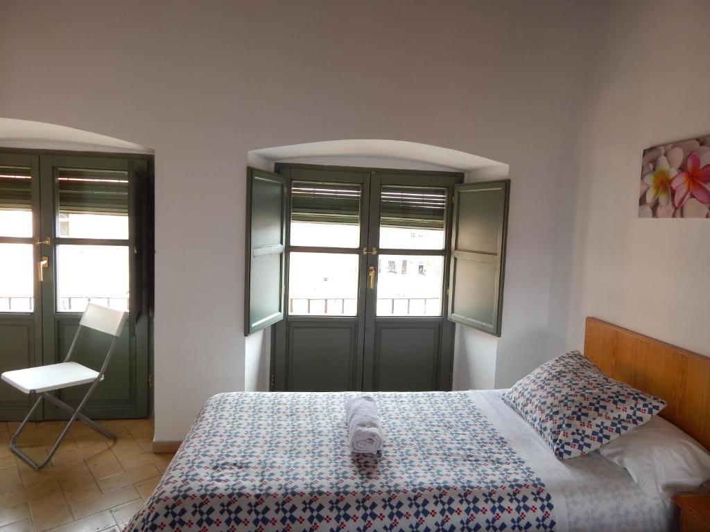 Postel nebo postele na pokoji v ubytování Casa La Espartería de la Corredera