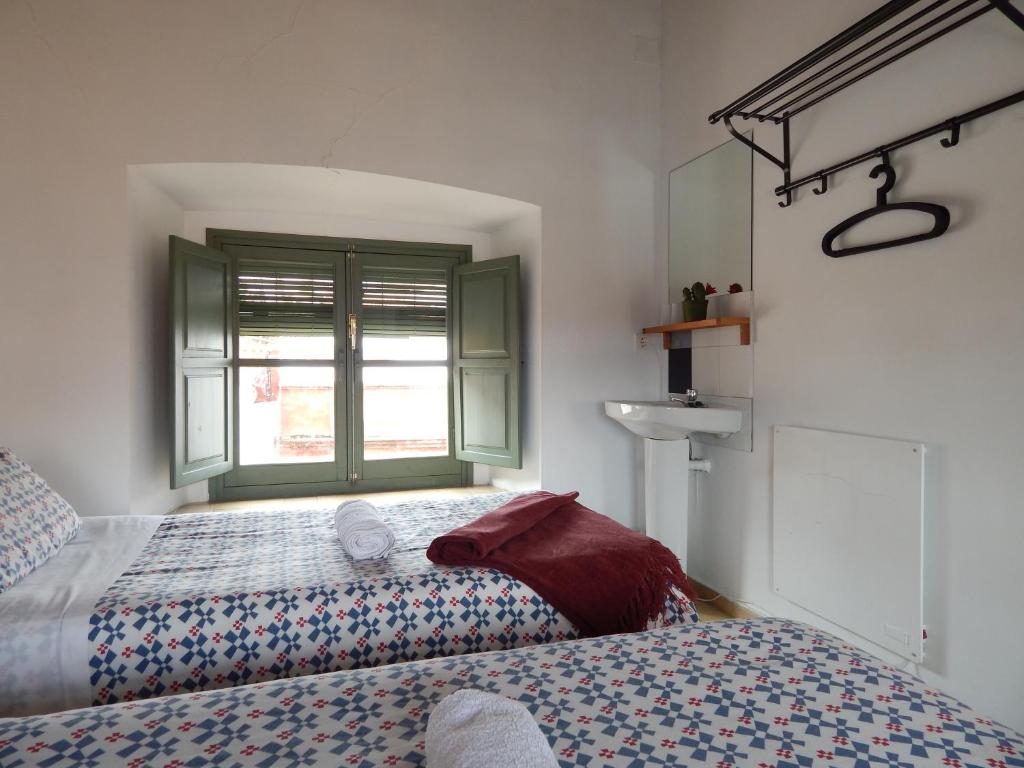 Postel nebo postele na pokoji v ubytování Casa La Espartería de la Corredera
