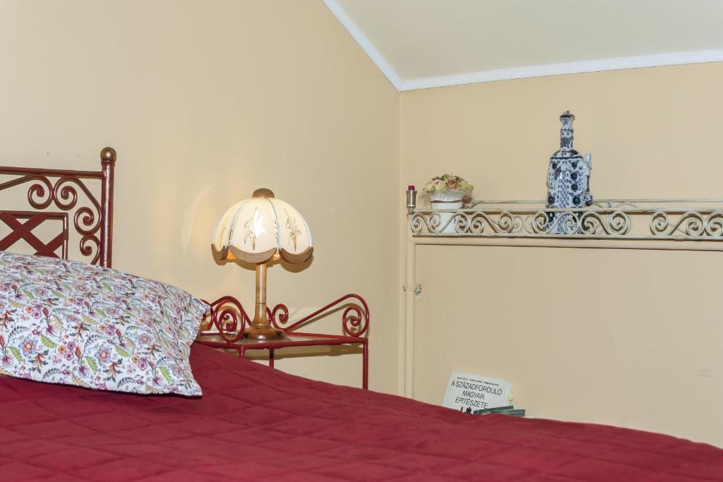 Posteľ alebo postele v izbe v ubytovaní Bellevue Budapest B&B