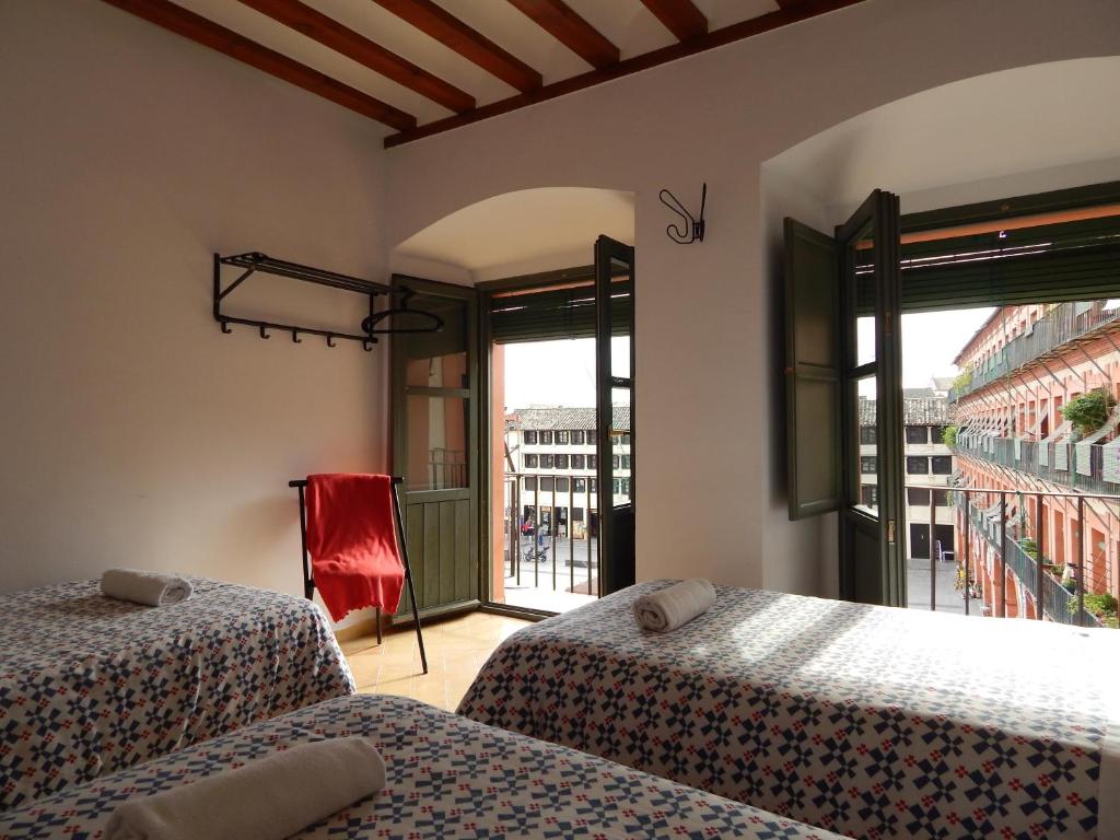 Postel nebo postele na pokoji v ubytování Casa La Espartería de la Corredera