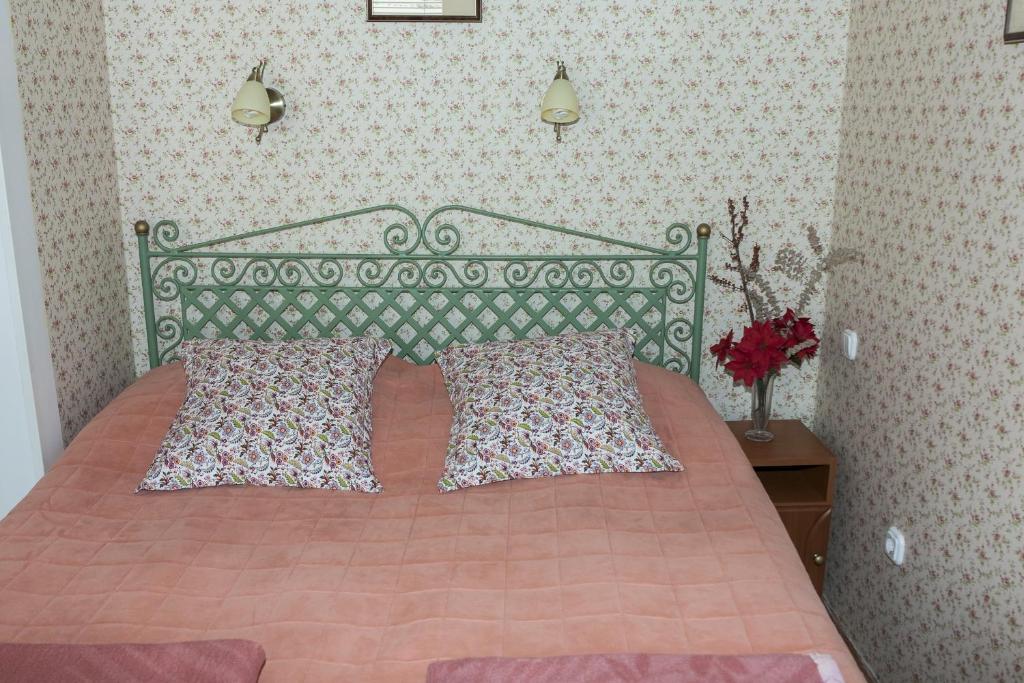 Posteľ alebo postele v izbe v ubytovaní Bellevue Budapest B&B