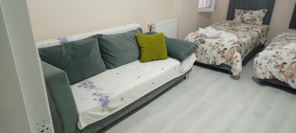 Postel nebo postele na pokoji v ubytování Melekler Pansiyon