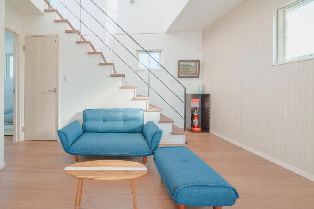 Posezení v ubytování Ryu shi ma Ocean View Villa