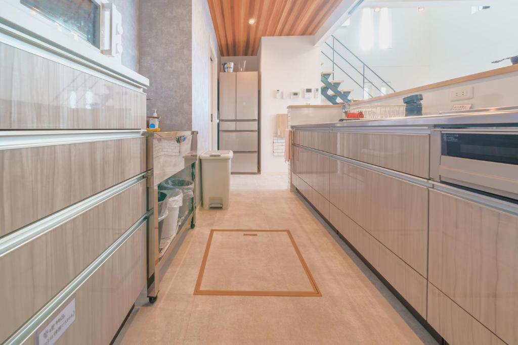 Kuchyň nebo kuchyňský kout v ubytování Ryu shi ma Ocean View Villa
