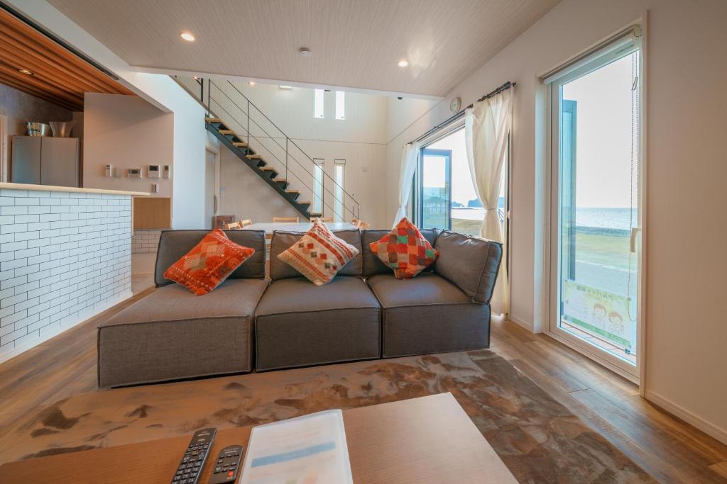 Posezení v ubytování Ryu shi ma Ocean View Villa