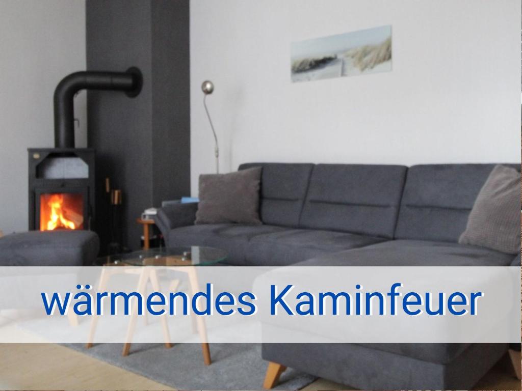 Φωτογραφία από το άλμπουμ του Böltser Hus Ferienwohnungen mit Strandkorb und Kamin 10 Gehminuten zum kurtaxefreien Sandstrand σε Neukirchen