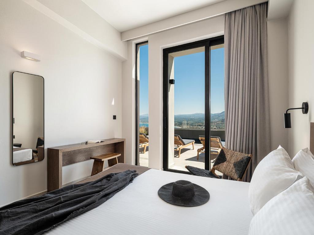 A bed or beds in a room at ZeusCave