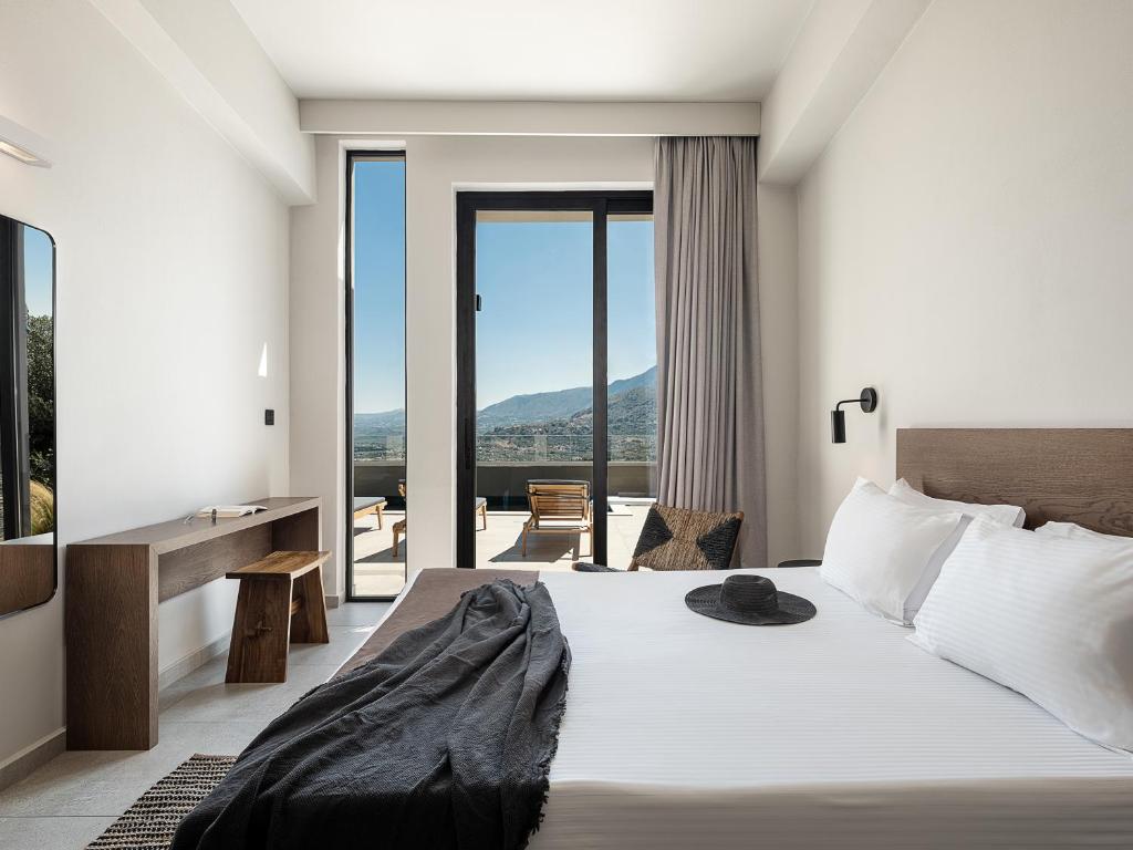 A bed or beds in a room at ZeusCave