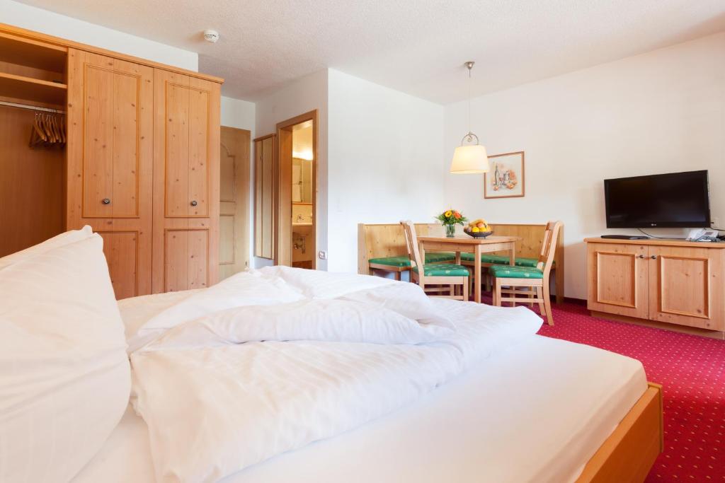 Voodi või voodid majutusasutuse Hotel Augarten toas