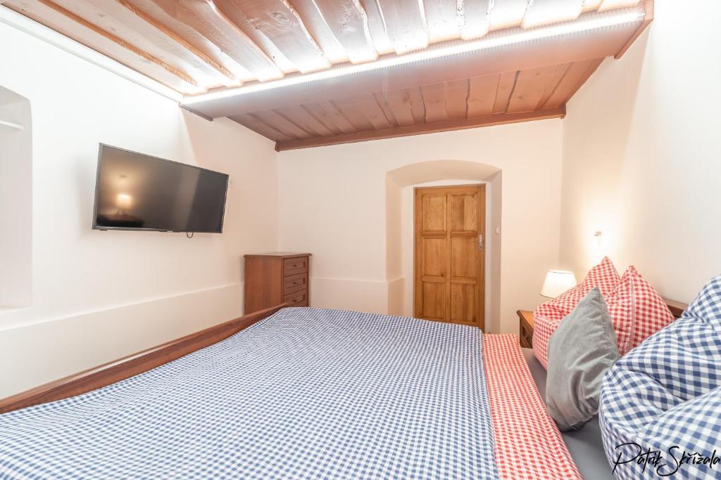 Postel nebo postele na pokoji v ubytování Roubenka Výletní