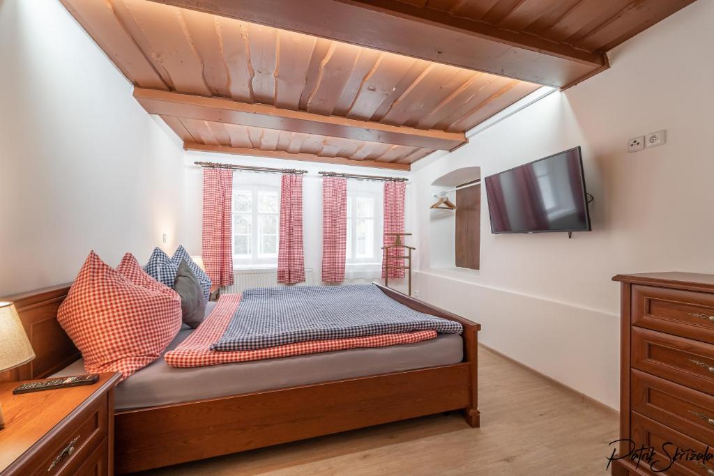 Postel nebo postele na pokoji v ubytování Roubenka Výletní