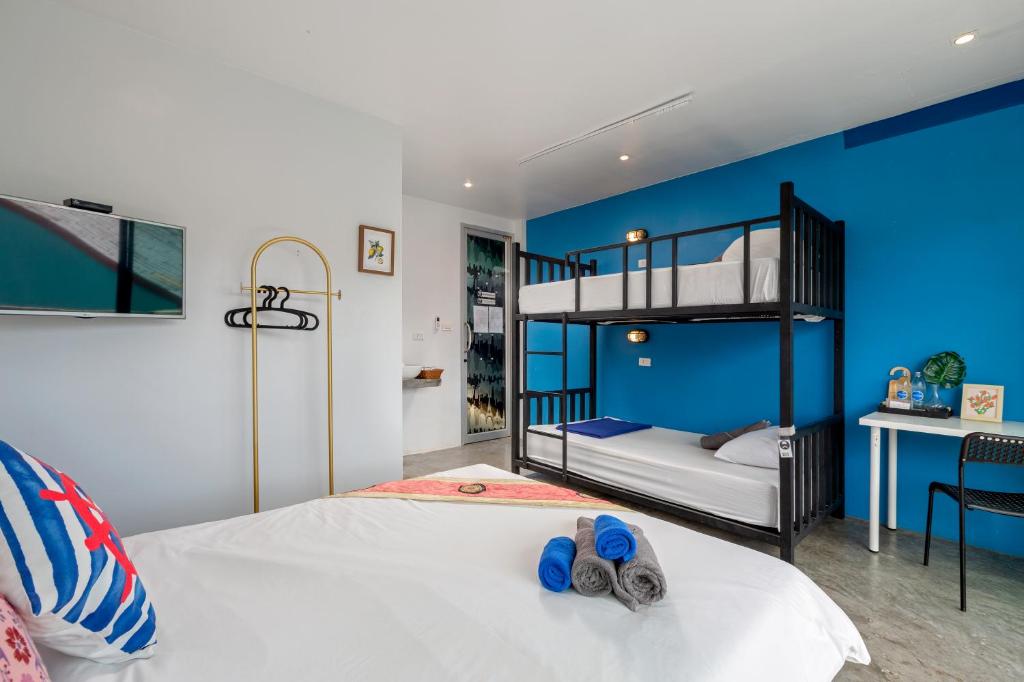 Postel nebo postele na pokoji v ubytování Hip Hostel - SHA Plus